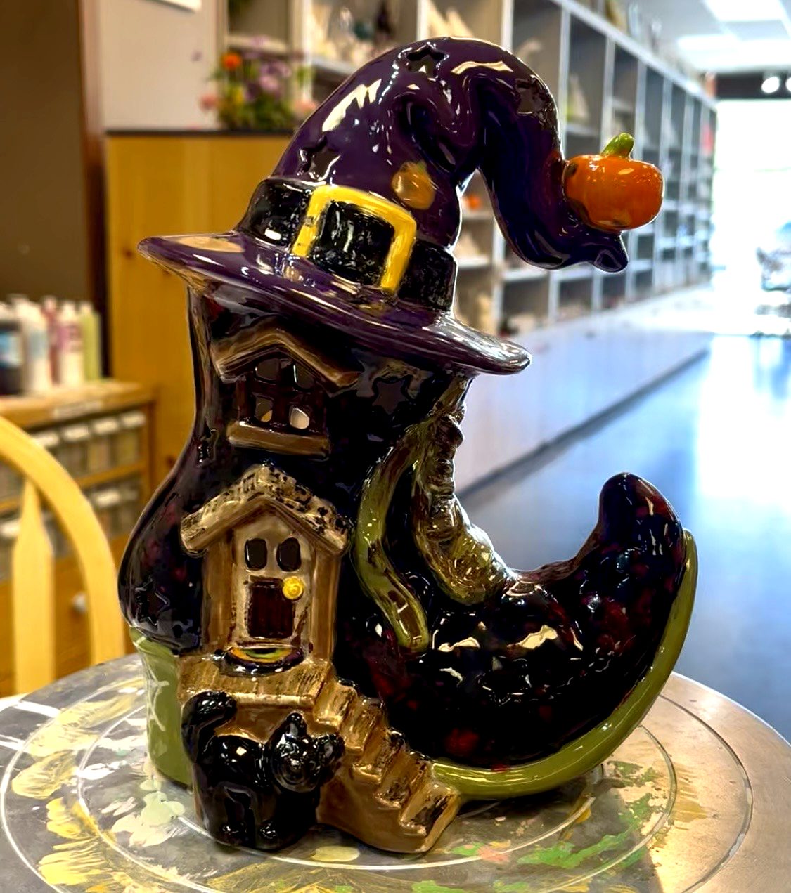 Hand painted witch hat boot lantern with a black cat and pumpkin